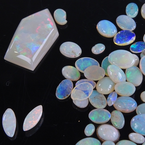 805 - A large quantity of various loose opals, including marquise, cabochons, black opal doublet etc