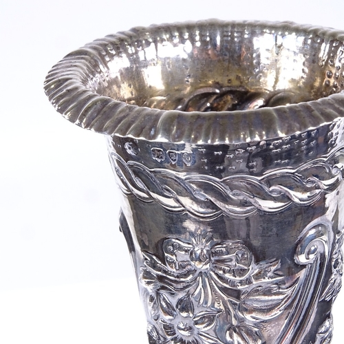 808 - A Victorian silver spill vase, tapered cylindrical form with relief embossed floral decoration, by W... 