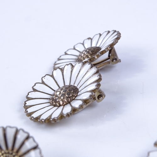 860 - ANTON MICKELSEN - 2 Danish vermeil sterling silver and white enamel daisy pattern brooches, and VOLM... 