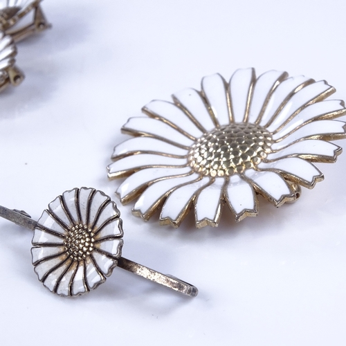 860 - ANTON MICKELSEN - 2 Danish vermeil sterling silver and white enamel daisy pattern brooches, and VOLM... 