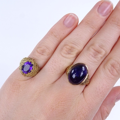 867 - 2 9ct gold and unmarked gold amethyst dress rings, sizes I and N, 10.4g total (2) (cabochon ring has... 