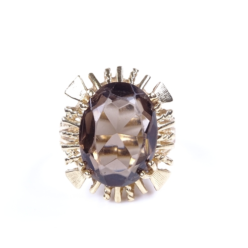 869 - 2 late 20th century 14ct and 9ct gold smoky quartz dress rings, both size M, 14ct - 7.1g, 9ct - 3.3g... 