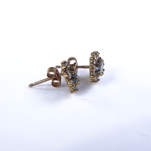 872 - A late 20th century 9ct gold blue topaz and diamond cluster matching ring and stud earring set, ring... 