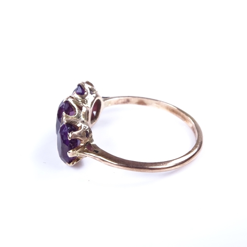 878 - An early 20th century 9ct gold 3-stone amethyst dress ring, setting height 8.6mm, size O, 2.4g