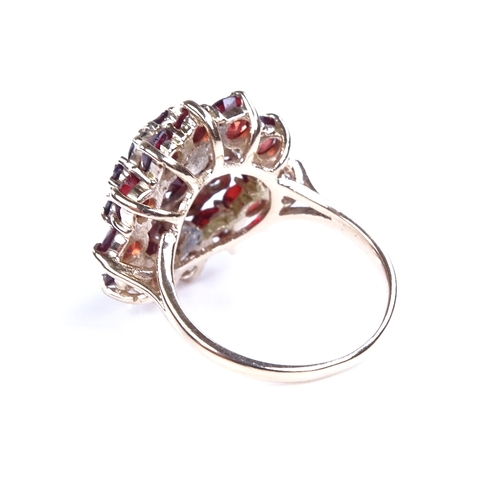 887 - A late 20th century 9ct gold garnet cluster flowerhead cocktail ring, setting height 21.7mm, size R,... 