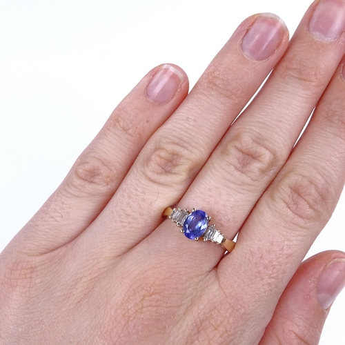 888 - A 9ct gold tanzanite and baguette-cut diamond dress ring, tanzanite length 7.6mm, size O, 2.7g