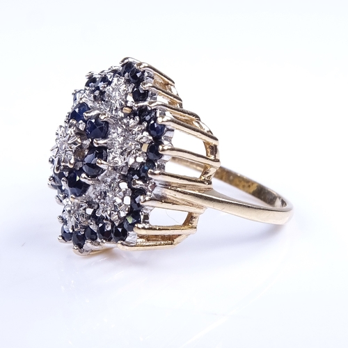 895 - A large late 20th century 9ct gold sapphire and diamond cluster cocktail ring, setting height 18.7mm... 