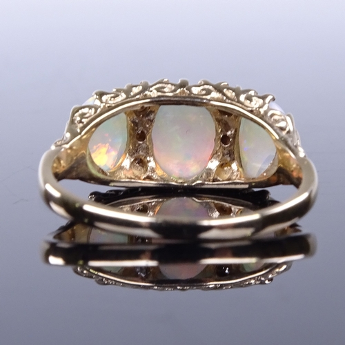 907 - A modern 9ct gold cabochon opal and diamond half hoop ring, setting height 9mm, size R, 3.6g