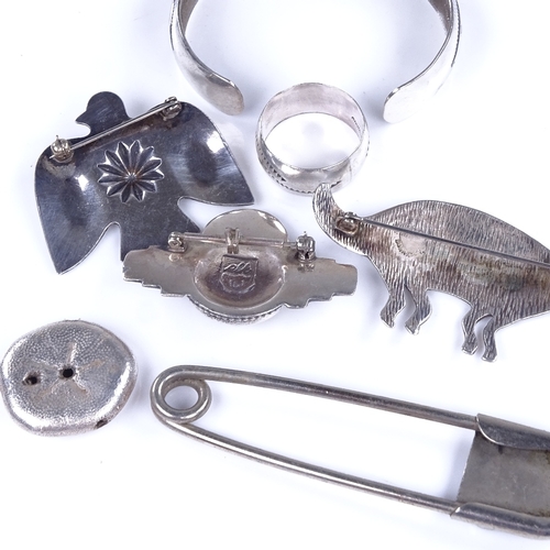 910 - Various South American silver and white metal jewellery, including brooches, torque bangle etc, 82.2... 