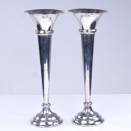 919 - A pair of George V silver spill vases, tapered cylindrical form with fluted rims, by J & R Griffin, ... 