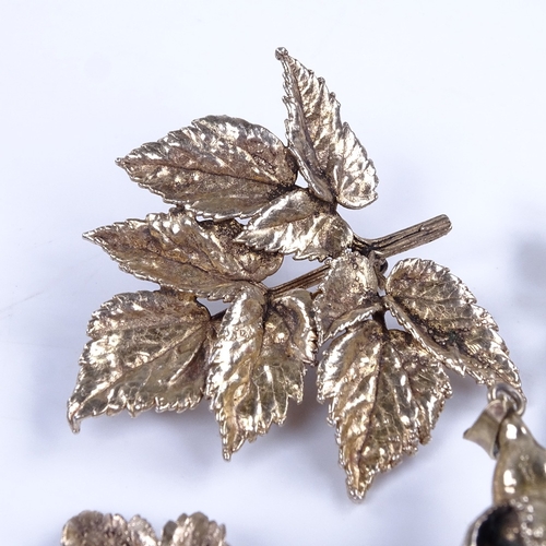 921 - Various Danish stylised vermeil sterling silver floral brooches and pendant, maker's include Flora D... 