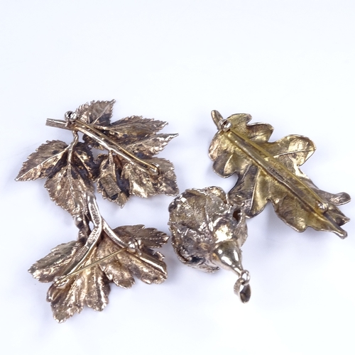 921 - Various Danish stylised vermeil sterling silver floral brooches and pendant, maker's include Flora D... 