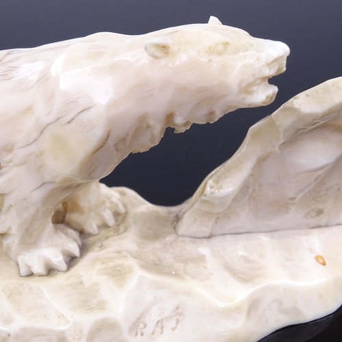 225 - A 19th century marine ivory carving of a polar bear, length 13cm