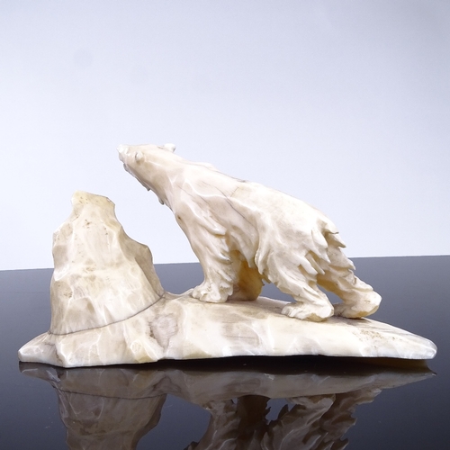 225 - A 19th century marine ivory carving of a polar bear, length 13cm