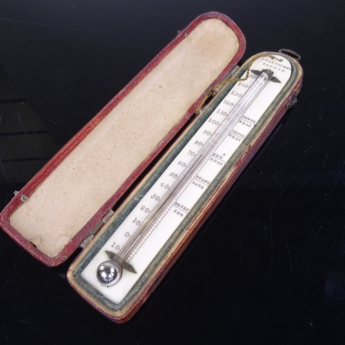 260 - An early 19th century ivory thermometer, by J Somalvic of London, in original leather case, case len... 