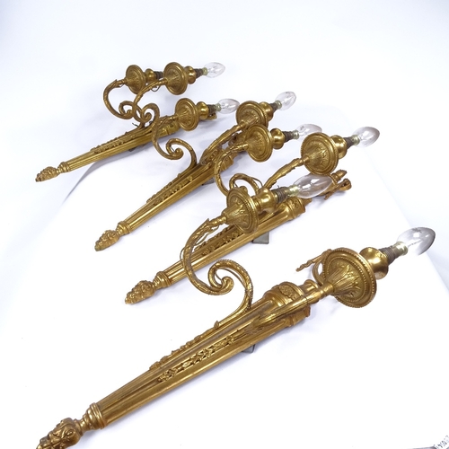 385 - A set of 4 19th century gilt-bronze Empire style twin-branch wall light fittings, height 50cm