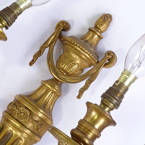 385 - A set of 4 19th century gilt-bronze Empire style twin-branch wall light fittings, height 50cm