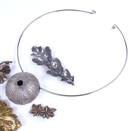 829 - Various Scandinavian silver jewellery, including sea urchin pendant neck torque, and gilt leaf brooc... 