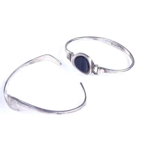 830 - 2 Danish stylised sterling silver bangles, including example by Niels Erik From, 21.9g total (2)