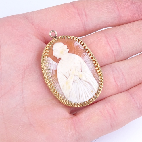 836 - A relief carved cameo shell panel pendant, depicting winged angel, in unmarked silver-gilt frame, pe... 