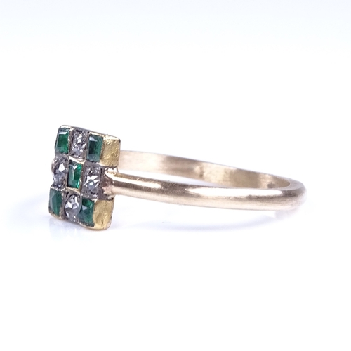 841 - An Art Deco style unmarked gold emerald and diamond chequerboard panel ring, set with square step cu... 