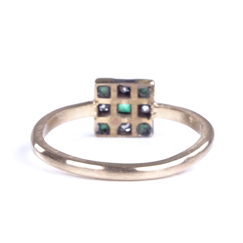 841 - An Art Deco style unmarked gold emerald and diamond chequerboard panel ring, set with square step cu... 