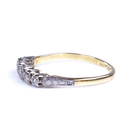 842 - An early 20th century 18ct gold graduated 5-stone diamond half hoop ring, total diamond content appr... 