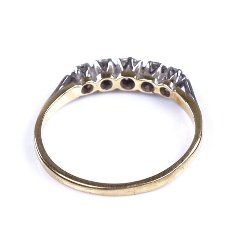 842 - An early 20th century 18ct gold graduated 5-stone diamond half hoop ring, total diamond content appr... 