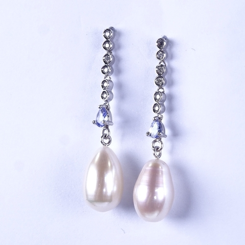 847 - A modern pair of unmarked white gold pearl tanzanite and diamond drop earrings, earring height 37.2m... 