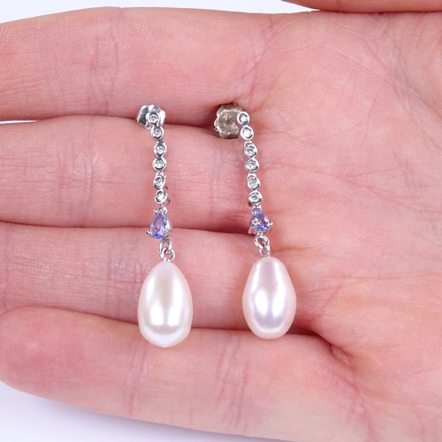 847 - A modern pair of unmarked white gold pearl tanzanite and diamond drop earrings, earring height 37.2m... 