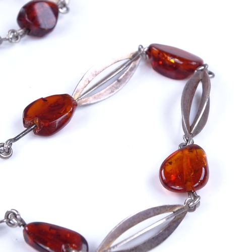 850 - HERMANN SIERSBOL - a Vintage Danish stylised sterling silver and specimen Baltic amber bead necklace... 