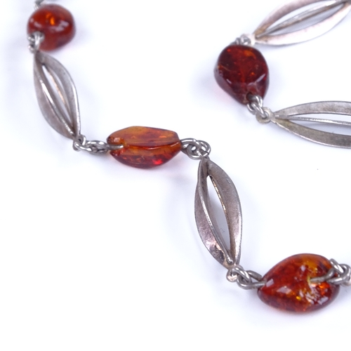 850 - HERMANN SIERSBOL - a Vintage Danish stylised sterling silver and specimen Baltic amber bead necklace... 