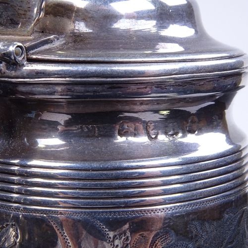 953 - A George III silver mustard pot, in the form of a half pint mug, reeded and bright-cut engraved foli... 