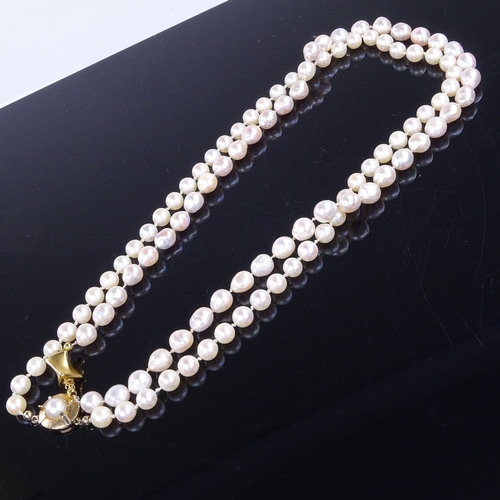 959 - 2 single-strand pearl necklaces, with 14ct gold clasps, both lengths 20