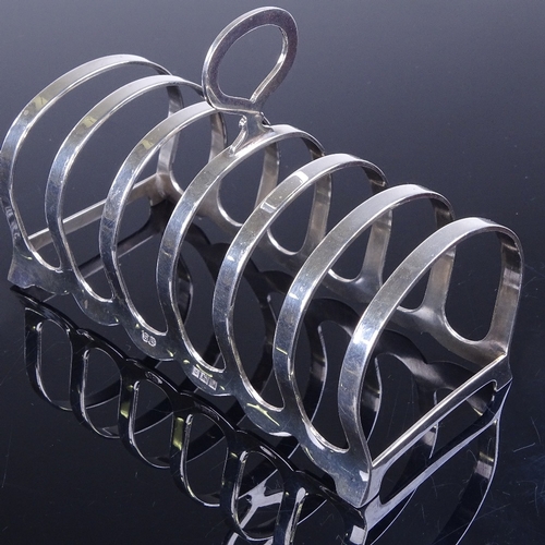 966 - An Elizabeth II silver 7-bar toast rack, by William Suckling, hallmarks Birmingham 1964, length 11cm... 