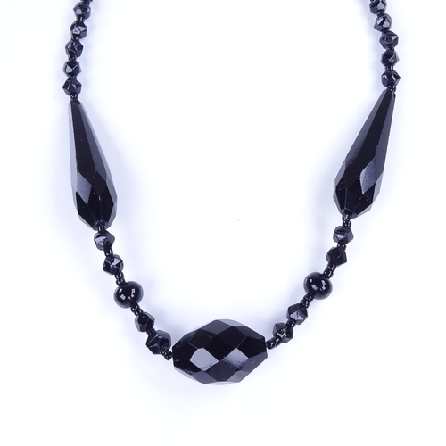 970 - A Vintage faceted jet necklace with unmarked silver clasp, necklace length 60cm, 35.9g