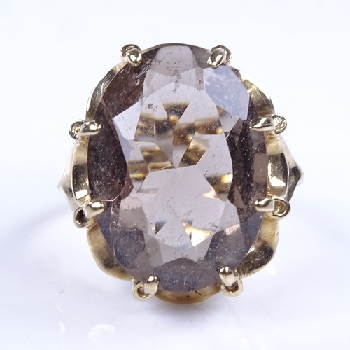 971 - A late 20th century 9ct gold smoky quartz dress ring, setting height 19.5mm, size M, 3.9g