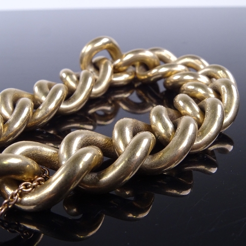 981 - A late 20th century solid 9ct gold curb link heart-padlock charm bracelet, bracelet length 16cm, 108... 