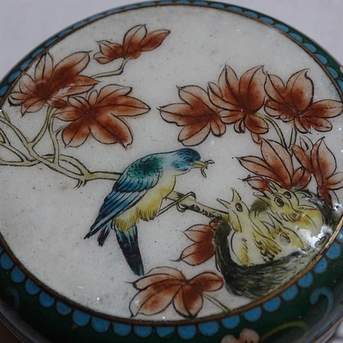 179 - A Chinese cloisonne enamel circular box, with bird and nest decorated lid, diameter 10.5cm