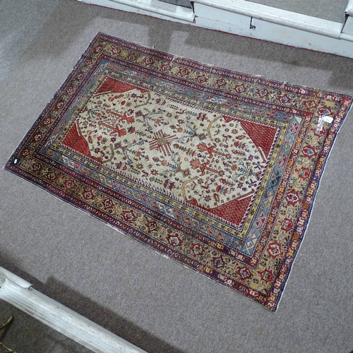 304 - A Persian handwoven geometric design rug