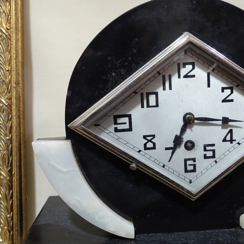 551 - An Art Deco slate and white onyx 30-hour mantel clock, silver diamond-shaped dial with Arabic numera... 