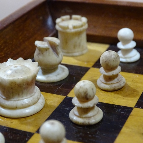 64 - A Jaques of London mahogany travelling chess set, mahogany-cased with rosewood and boxwood board, an... 