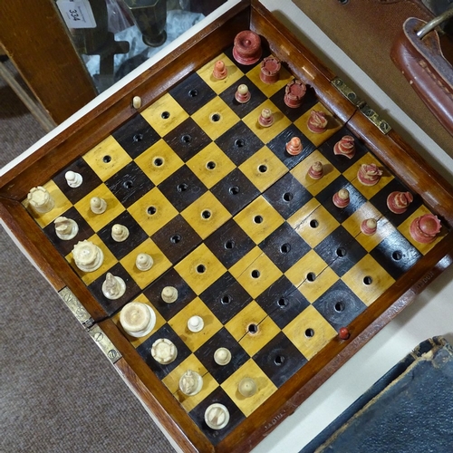 64 - A Jaques of London mahogany travelling chess set, mahogany-cased with rosewood and boxwood board, an... 