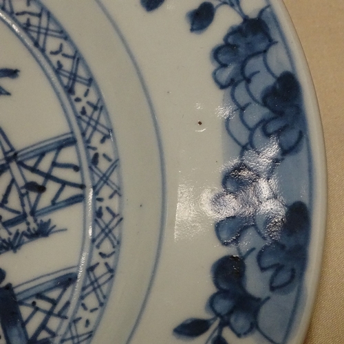 129 - A pair of Chinese blue and white porcelain plates, hand painted bamboo designs, diameter 23cm