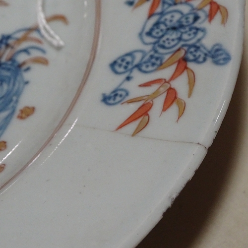 130 - A pair of Chinese porcelain plates with blue red and gilt painted decoration, diameter 23cm, and a p... 