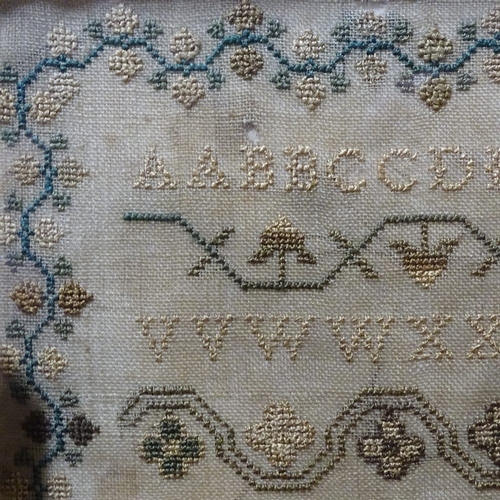 186 - Early 19th century needlework sampler on silk ground, by Sarah Walker, dated 1823, framed, overall f... 