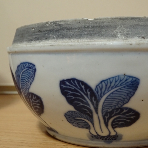 244 - A Chinese blue and white porcelain bowl and cover, with pak choi decoration, diameter 15cm