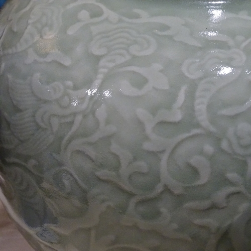 246 - A Chinese celadon glaze porcelain vase, relief moulded dragon design, with seal mark, height 27cm, r... 