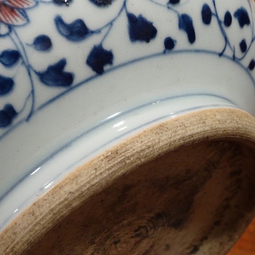 249 - A Chinese blue and white porcelain bowl, with red flowers, diameter 18cm, height 9.5cm