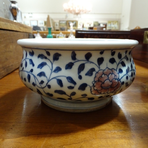 249 - A Chinese blue and white porcelain bowl, with red flowers, diameter 18cm, height 9.5cm